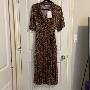 & other stories leopard print midi dress with collar and pleated skirt.